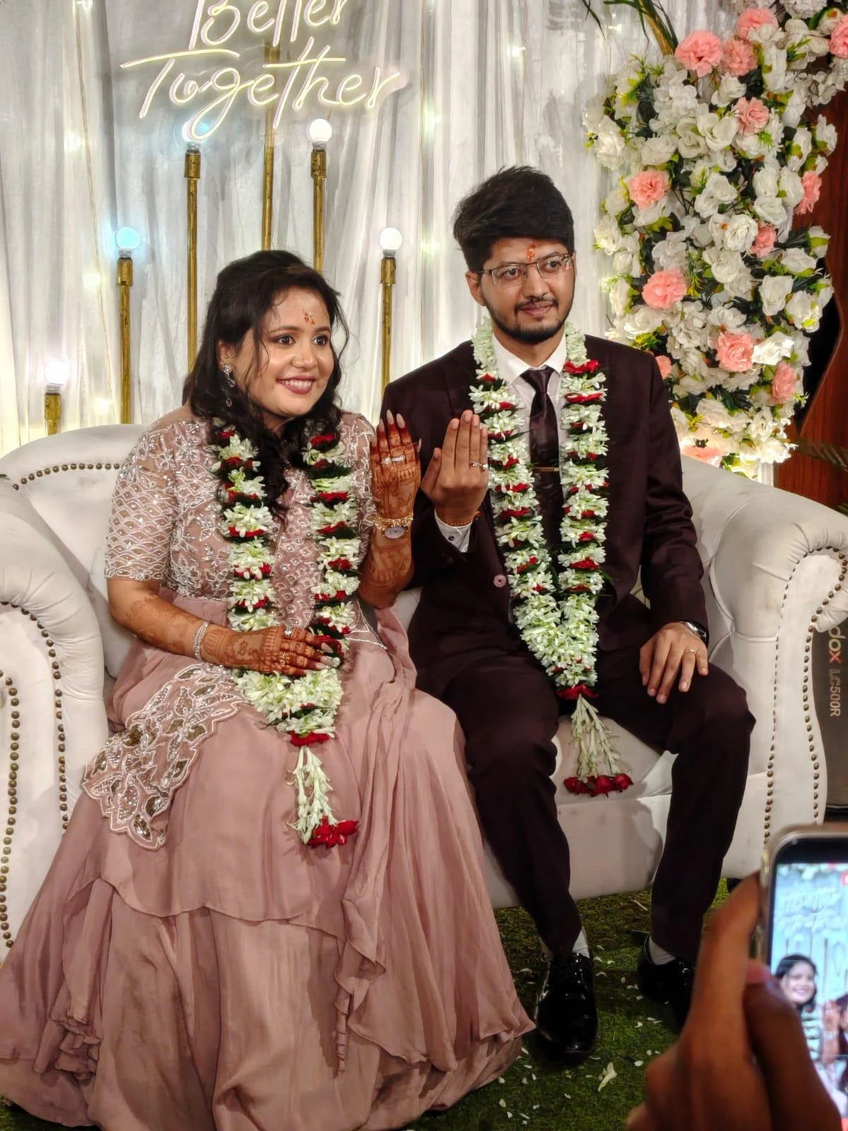 Aishwarye and Anmol showing their engagement rings