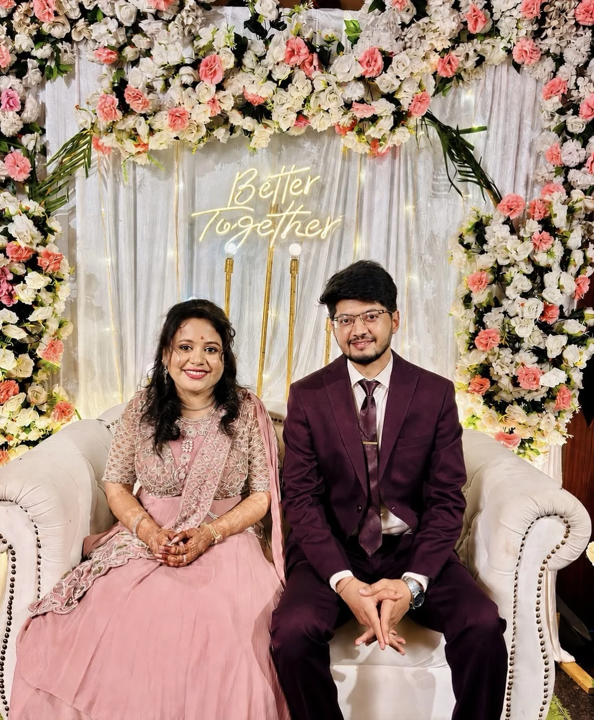 Aishwarye and Anmol seated together at their engagement